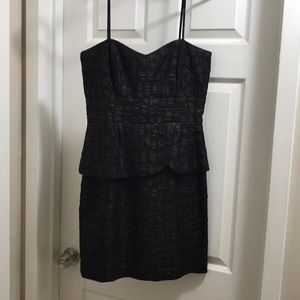 Strapless black peplum cocktail dress